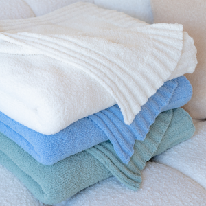 Coastal blue throw deals